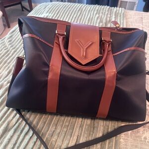 Black and brown YSL duffel bag